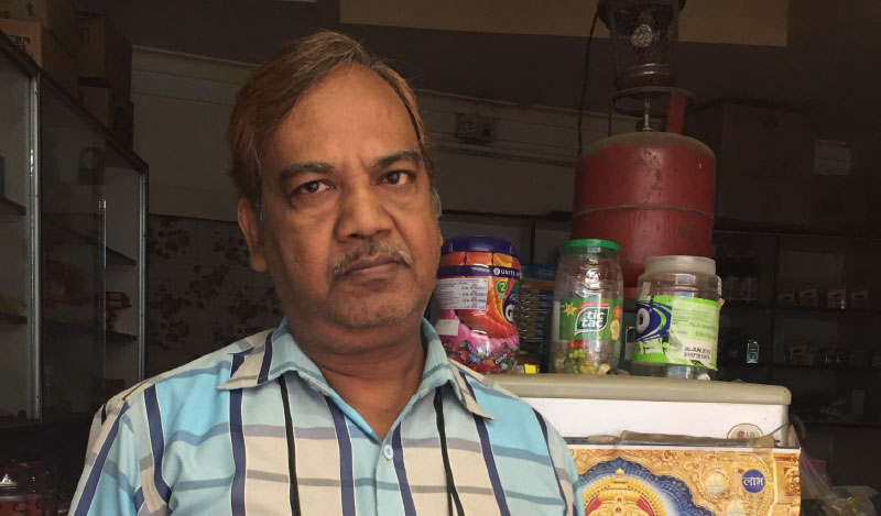Pawan Agarwal at his general store in Jhumri Telaiya