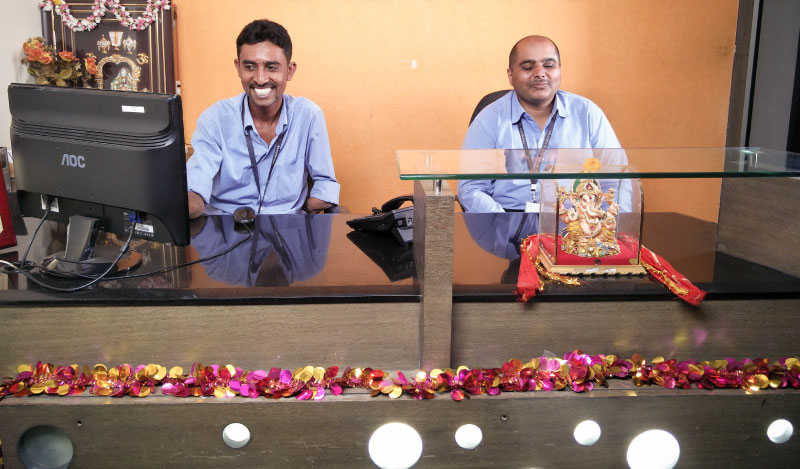 Srinivas and his visually impaired colleague Madhu at Vindhya E-Infomedia